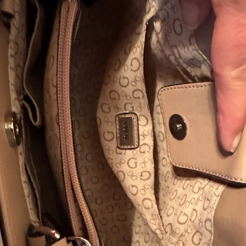 GUESS Beige Satchel Bag with crossbody strap.